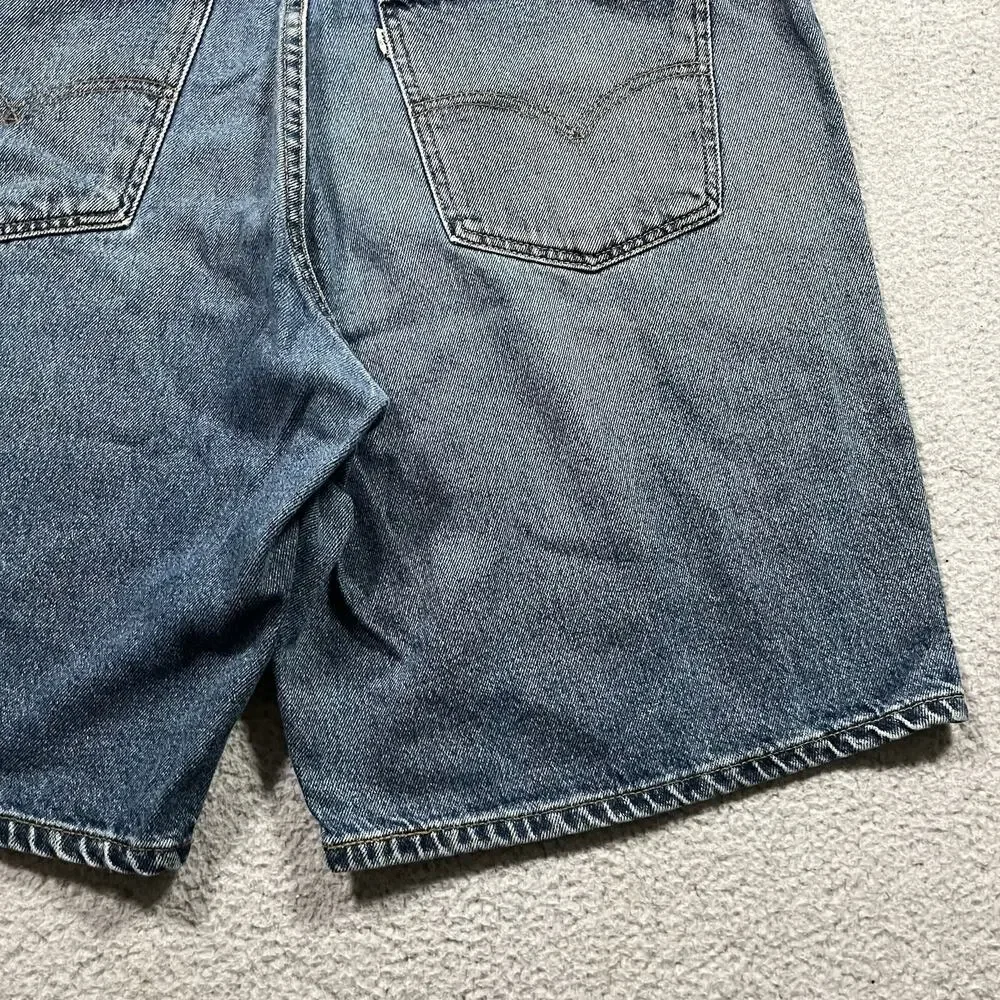 Vintage Levis 560 Shorts Mens 36 Blue Made USA Denim Baggy Jorts Loose Fit